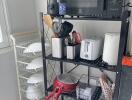 Kitchen utilities and appliances on shelves