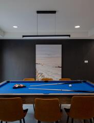 Modern game room with pool table and minimalist decor