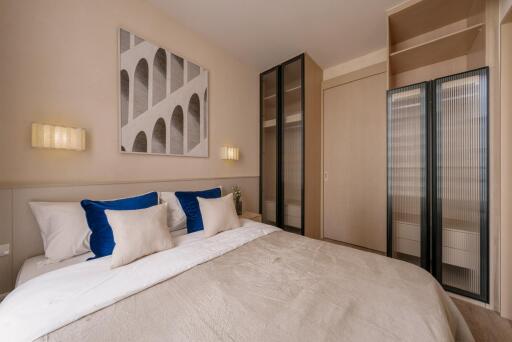 Bedroom with modern decor and built-in wardrobe