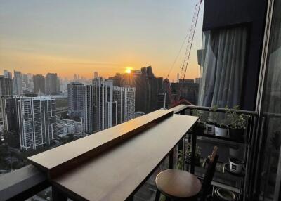 Balcony with city view at sunset