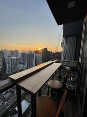 Balcony with city view at sunset