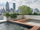 Modern rooftop terrace with a small pool and city view