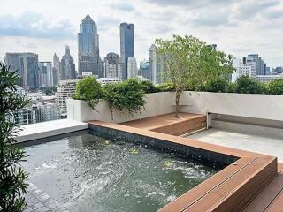 Rooftop pool with city skyline view