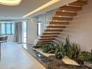 Modern living space with floating staircase and indoor garden