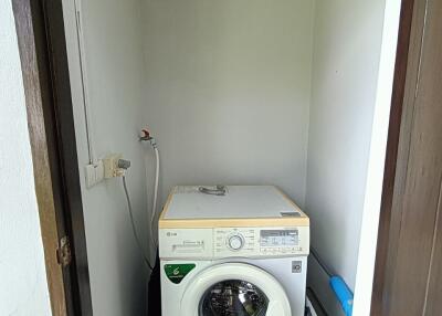 Small laundry space with a washing machine