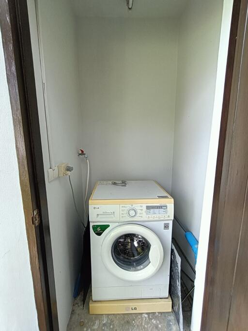 Small laundry space with a washing machine