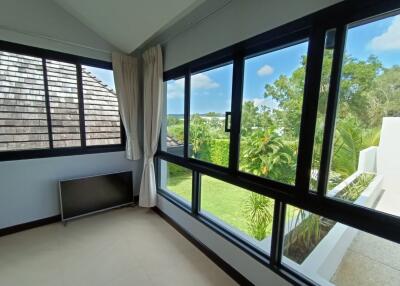 Living area with large windows and scenic view