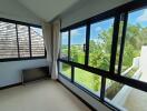 Living area with large windows and scenic view