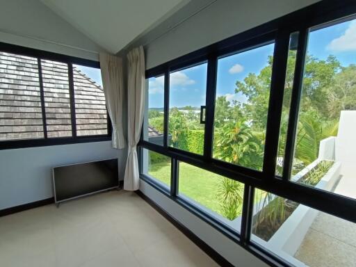 Living area with large windows and scenic view