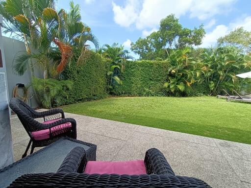 Spacious backyard with lush greenery