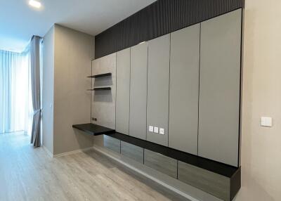 Modern minimalist living room with wall-mounted cabinets