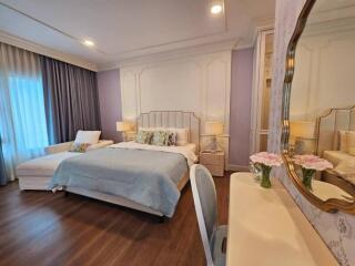 Luxurious bedroom with king-size bed and elegant decor