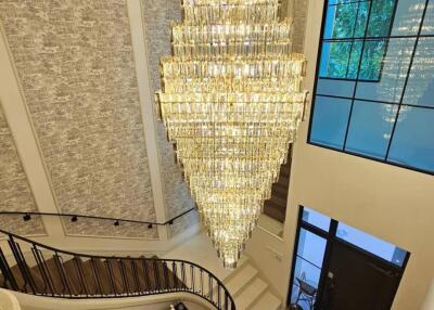 Spacious foyer with grand chandelier