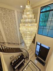 Spacious foyer with grand chandelier