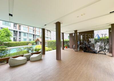 Semi-outdoor area with pool view