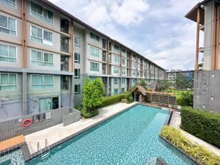 Modern apartment complex with a swimming pool