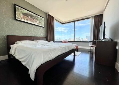 Spacious bedroom with large window view