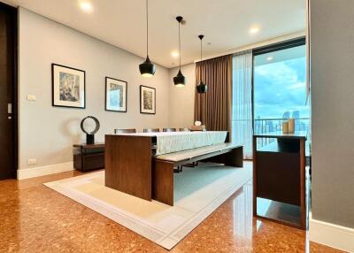 Modern dining room with wooden furniture and large windows