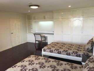 Bedroom with built-in wardrobes and study desk