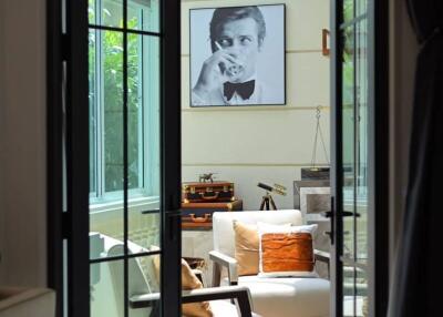 Interior of a cozy living room with glass doors