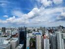 City skyline view with buildings under a blue sky