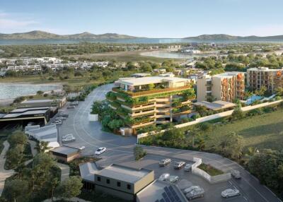 Aerial view of modern apartment buildings and surrounding landscape