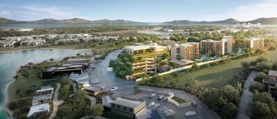 Aerial view of modern apartment buildings and surrounding landscape