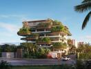 Modern apartment building with lush greenery on balconies