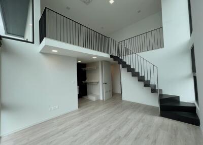 Modern duplex with staircase and loft area