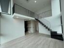 Modern duplex with staircase and loft area