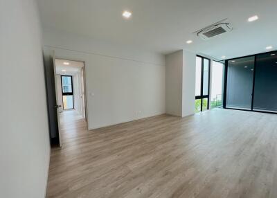 Spacious and modern living room with large windows