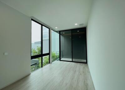 Modern living room with large windows and natural light