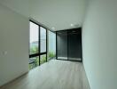 Modern living room with large windows and natural light