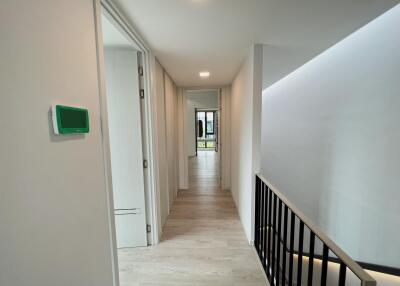 Contemporary hallway with laminate flooring