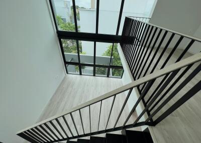 Modern staircase with large windows