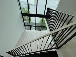 Modern staircase with large windows