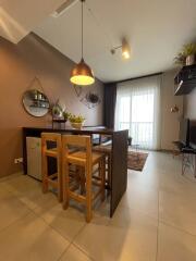 Modern living room with dining area and TV