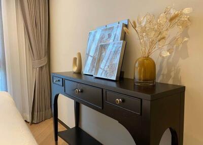 Bedroom with a decorative console table