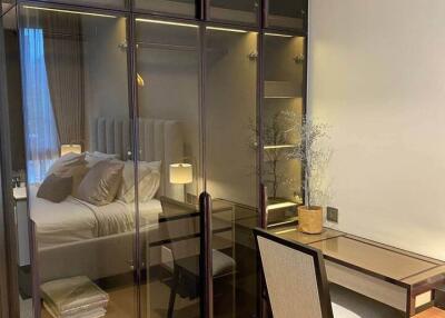 Bedroom with glass wardrobe and study desk