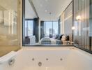 Modern bathroom with a view into the bedroom