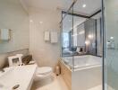 Modern bathroom with glass shower and bathtub