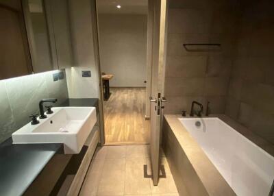 Modern bathroom with sink and bathtub