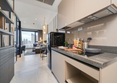 Modern kitchen with black countertops and open layout