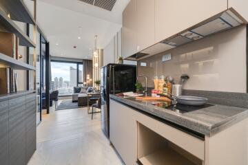 Modern kitchen with black countertops and open layout