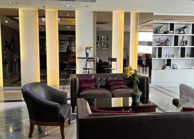 Modern lounge area with seating and decorative elements