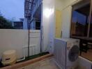 Outdoor area with washing machine