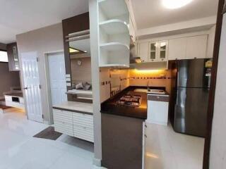 Modern kitchen with sleek cabinetry and appliances