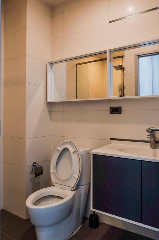 Modern bathroom with toilet and vanity