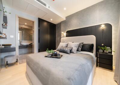 Modern bedroom with stylish decor and ensuite bathroom