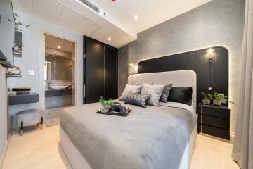 Modern bedroom with stylish decor and ensuite bathroom